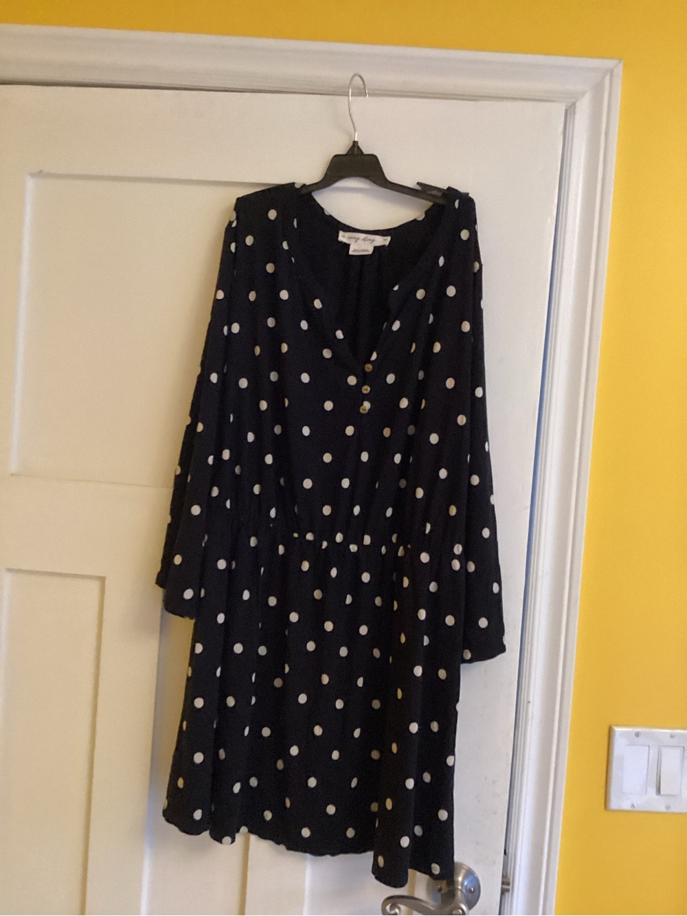 I think it’s Penningtons Black Polka Dot Mini Dress/top